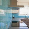 teal tile ikea kitchen