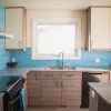 teal tile ikea kitchen